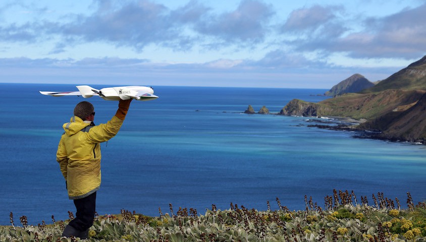 Launching a drone. Photo: Jarrod Hodgson.